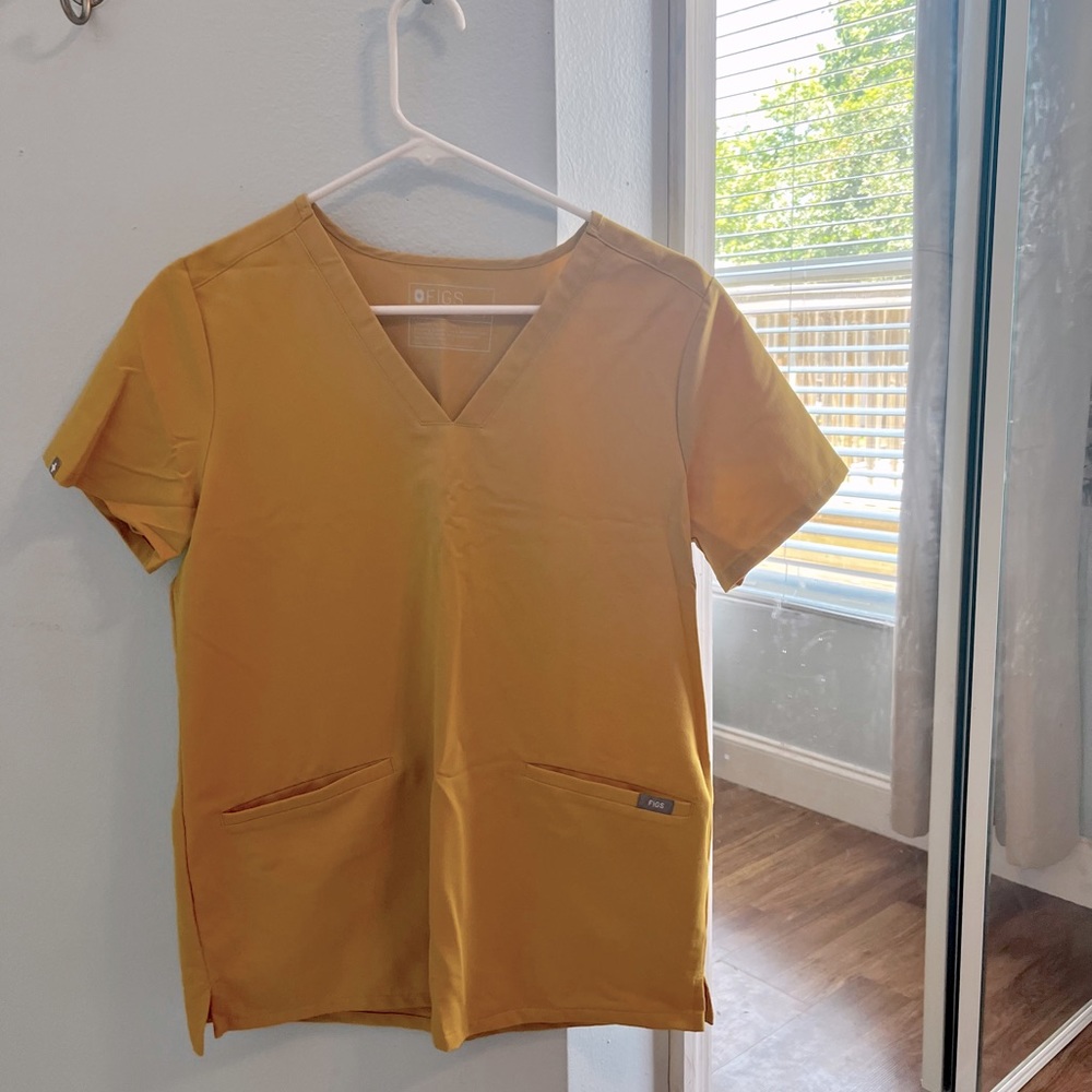 Size small Figs scrub top. Gold, like new condition